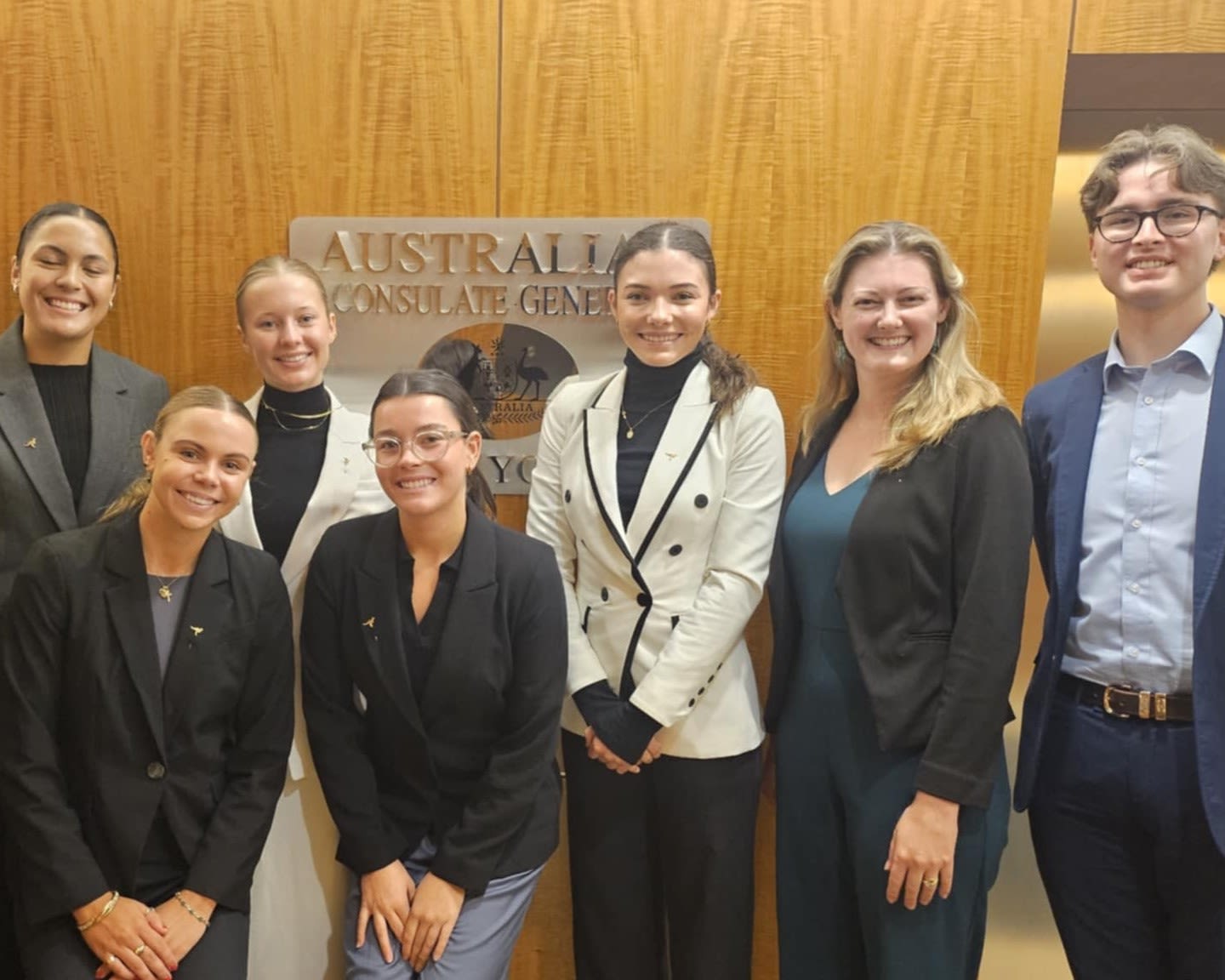 A group of people smiling.