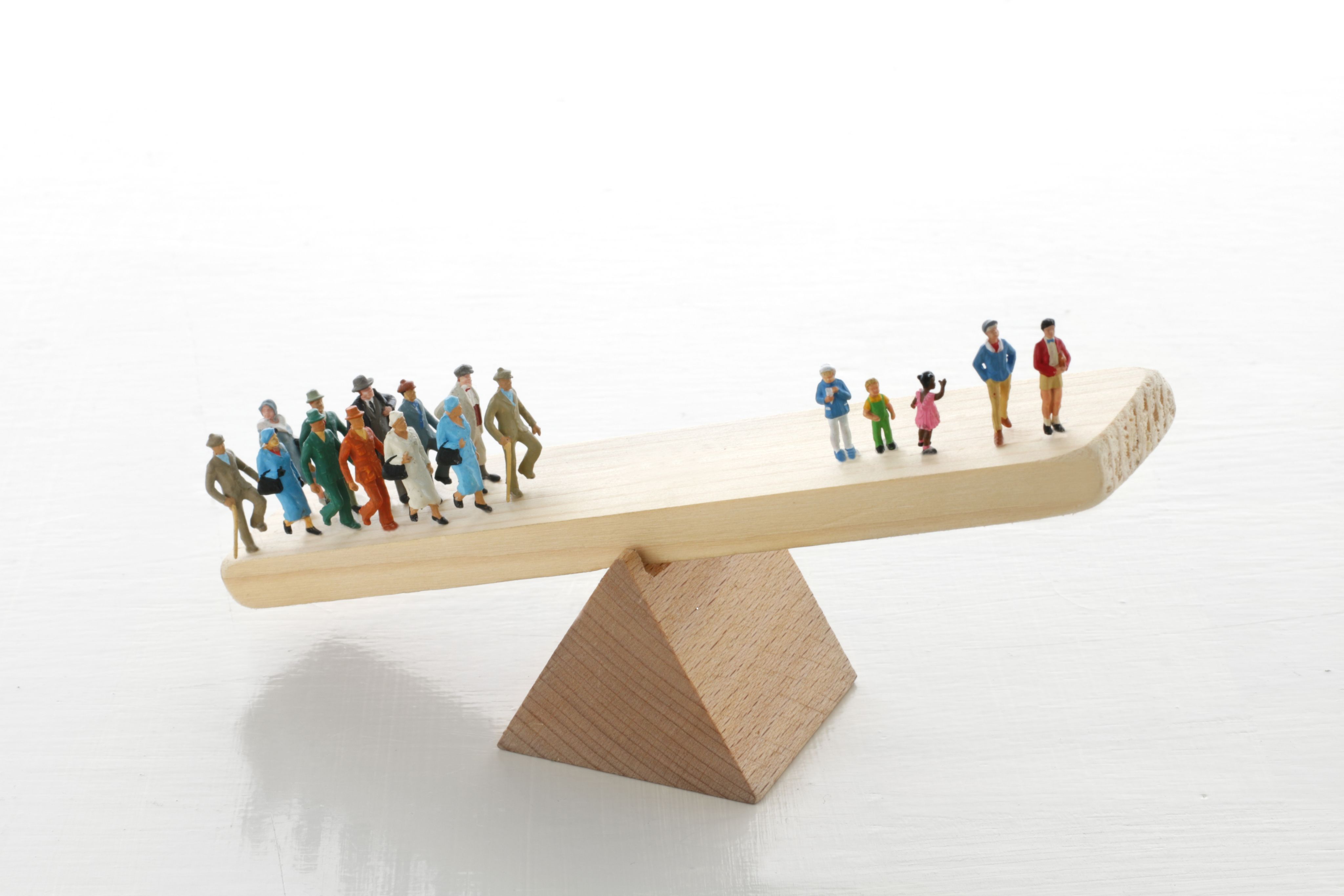 group of people standing on green grass field during daytime