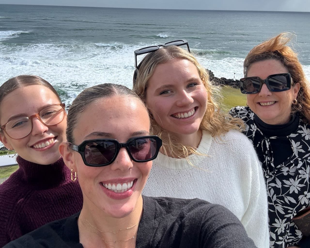 a group of women smiling