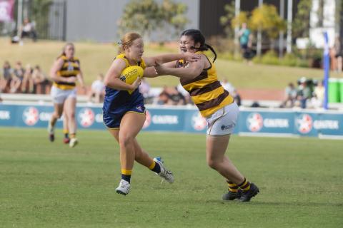 AFLW tackle break.jpg