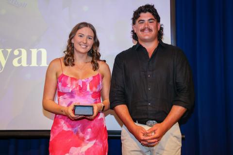 Maddie Ryan receiving the 2024 Hart Sapphire Series Coaches Award 