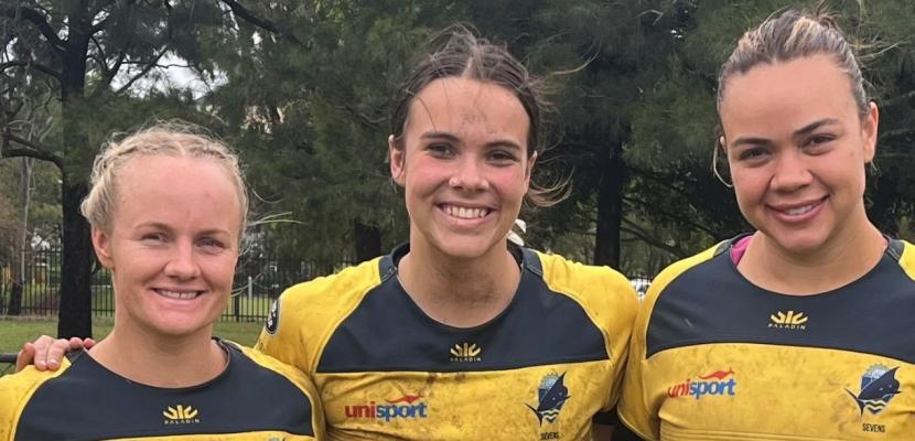 Georgia Grey (centre) with fellow Bond teammates Emily Bass and Caity Costello.