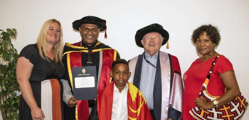 Glen Mola Pumye (and family) with Emeritus Professor John Farrar