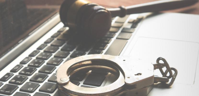 Stock image of gavel and handcuffs