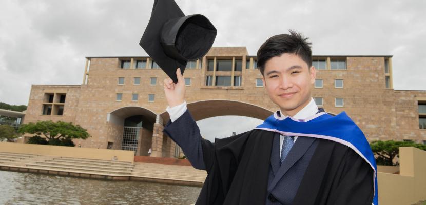 Juris Doctor Graduate Jordon He in front of The Arch