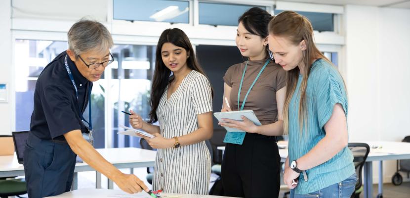 Project management students working on a project