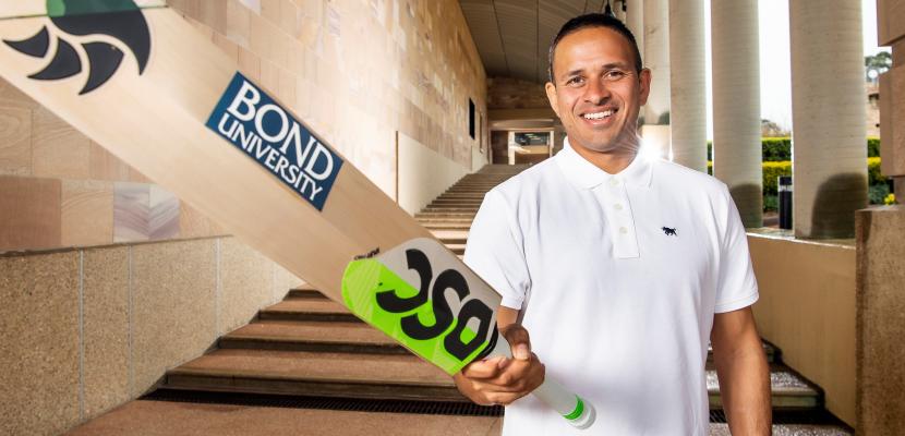 Cricketer Usman Khawaja on the thinking steps holding a cricket bat